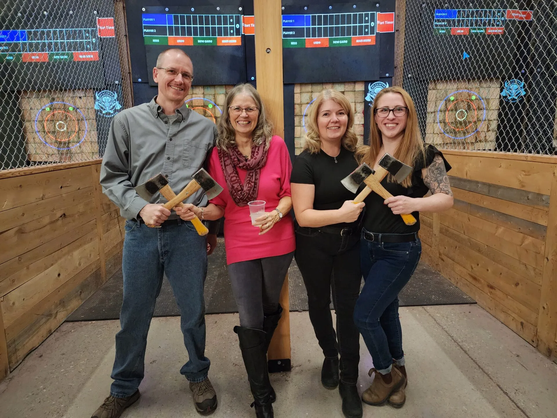 CSOLVE team members at an axe throwing team event