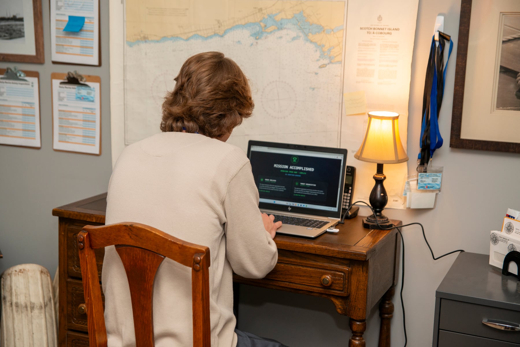 A participant completing a cybersecurity learning activity on a laptop