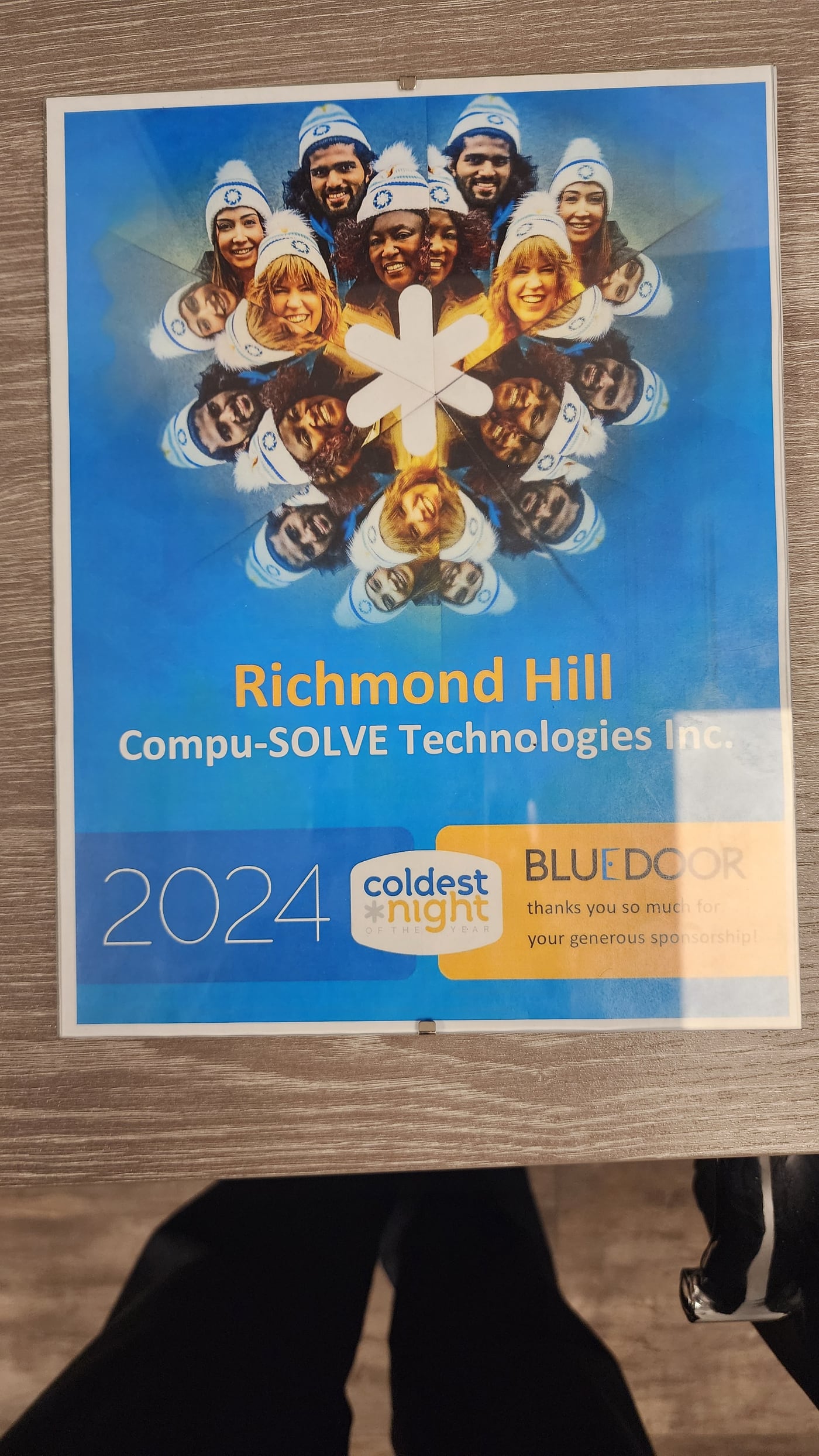 A Coldest Night of the Year sponsorship sign thanking Compu-SOLVE Technologies