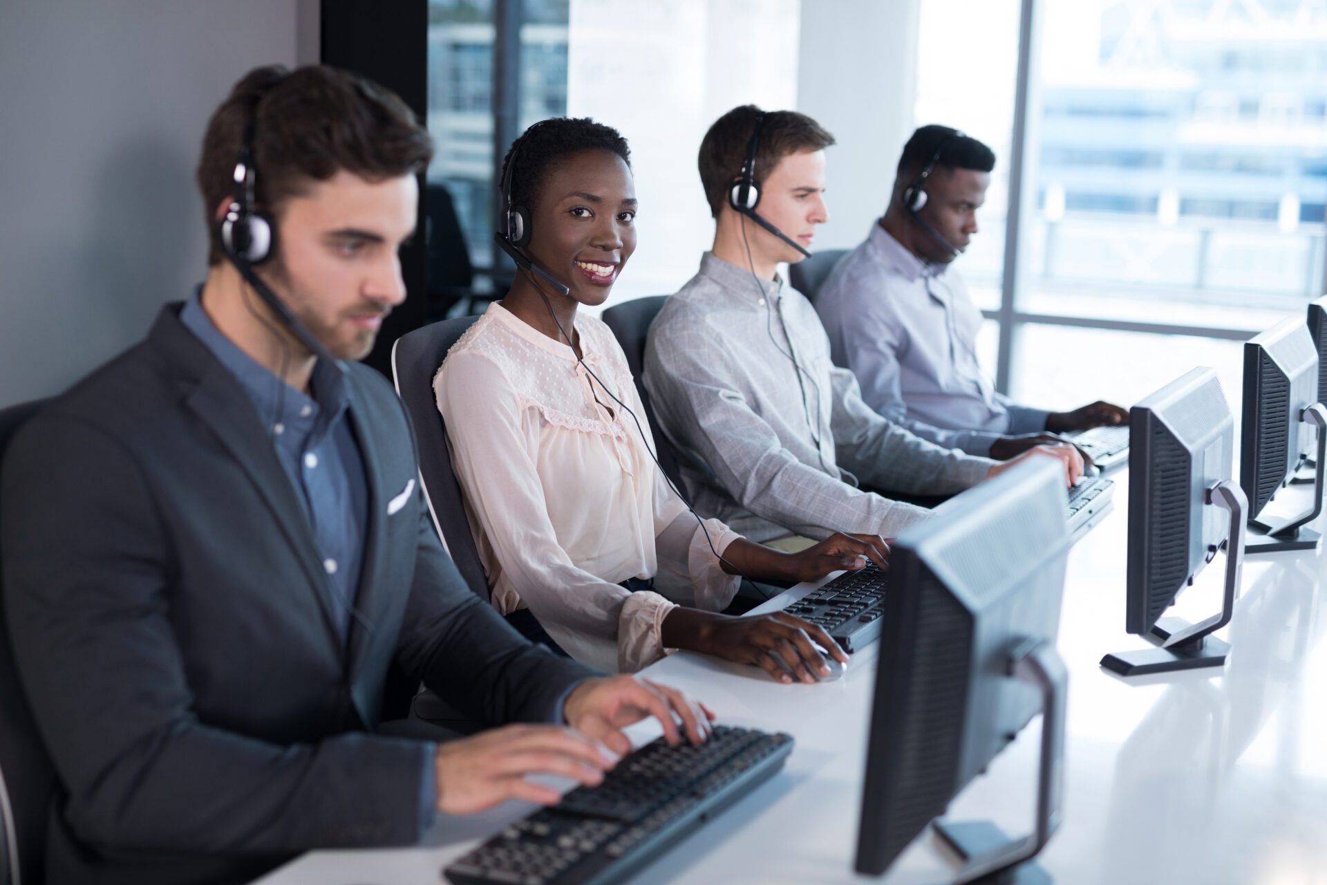 Customer service executives working at office
